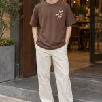 Áo thun đồng phục form suông unisex màu nâu cà phê, vải cotton compact, in lụa trước ngực