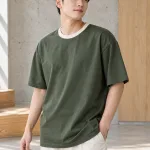 Áo thun đồng phục form oversize 220gsm màu xanh rêu, vải cotton 100%, bo cổ tương phản