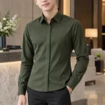 Áo sơ mi đồng phục form nữ chiết eo màu xanh rêu, vải kate silk, nẹp giấu nút