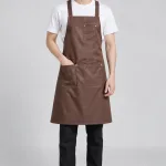 Tạp dề đồng phục dạng váy chống nước màu nâu cà phê, vải vải chống thấm, túi ngực nhỏ