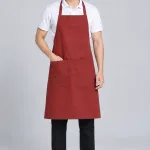 Tạp dề đồng phục dài đeo cổ màu đỏ gạch, vải kaki cotton, túi đôi phía trước