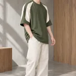 Áo nhóm form oversize màu xanh rêu, vải cotton compact, phối tay hai màu