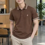 Áo lớp polo cổ bẻ sọc màu nâu cà phê, vải cotton mềm 220gsm, logo nhỏ trước ngực