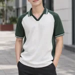 Áo lớp polo cổ V phối viền màu xanh rêu, vải cotton poly, phối hai màu
